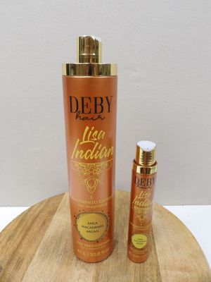 a close up of two bottles of debby hair products on a wooden tray