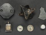 an image of a group of metal objects sitting on top of a table