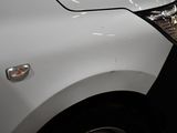 a close up of a car that has a denting on it