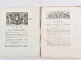 an open book with a picture of a man and a woman on it