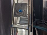 a ladder that is leaning against a wall in a room