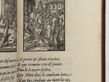 an open book with a picture of people in it
