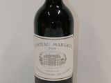 a bottle of wine that is sitting on a table