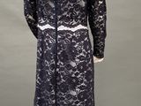 an image of a mannequin wearing a black lace dress