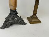 pair of antique brass candlesticks with carved wood bases