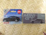 a toy car that is sitting on top of a box
