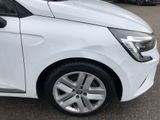 a white car that is parked in a parking lot