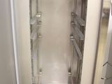 an image of a stainless steel refrigerator in a kitchen