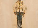 une vieille photo représentant un homme en uniforme militaire, muni d'une épée