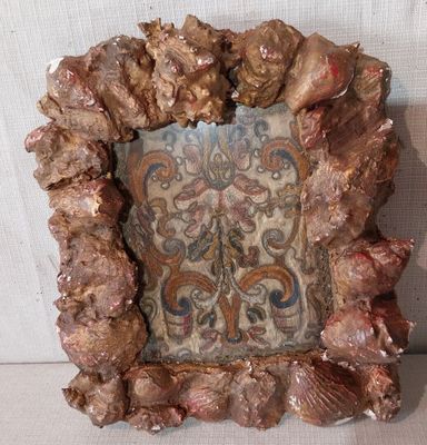 a picture of a picture of a picture of shells in a frame