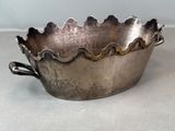 silver plated bowl with scalloped edge and handle