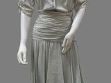 an image of a mannequin dressed in a gray dress