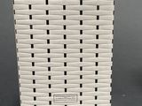 a close up of a white box with a black and white label