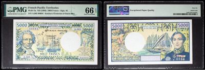 three different types of currency are on display in a display case