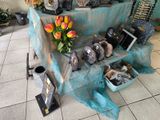many vases and vases on a table in a room