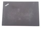 a black mouse pad with a mouse on top of it