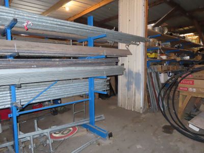 a large amount of steel pipes in a warehouse
