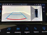 a picture of a car ' s rear view camera on a cell phone