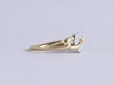 an image of a diamond ring on a white surface