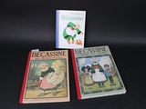 three children ' s books are sitting on a black surface