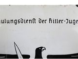 a sign with a bird and a surfboard on it