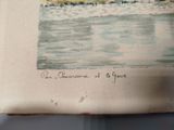 a picture of a book with a picture of a boat in the water