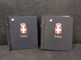 two black books with red and white designs on them