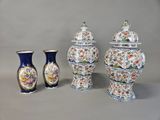 three vases that are next to each other on a table