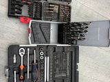a lot of tools that are laying out on the floor