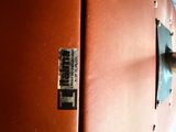 a close up of a brown suitcase with a tag on it