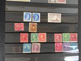 a picture of a picture of a collection of stamps on a wall