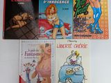 plusieurs livres pour enfants sont alignés sur une surface blanche