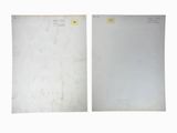 two sheets of paper with stickers on them sitting next to each other