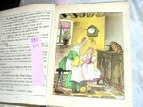 an open book with a picture of a little girl and a man