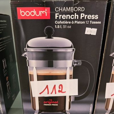 two boxes of bodum french press coffee on display in a store