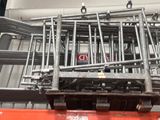 a picture of a forklift with a bunch of metal bars
