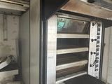 a oven that is sitting inside of a room