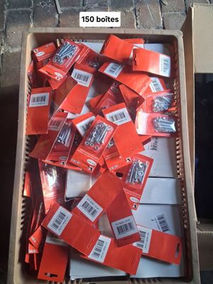 a box full of red and white items on the ground