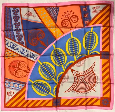 an image of a square scarf with a colorful design on it