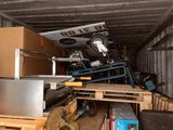 a room with a lot of boxes and other things in it