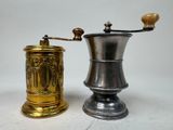 two different types of coffee grinders on a table