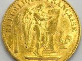 une image représentant une pièce d'or sur laquelle figure un ange