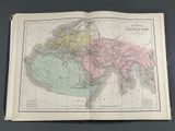 an old map of the asia and the middle east in a book
