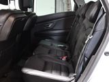 the back seat of a car with a seat belt in it