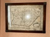 a picture of a map hanging on the wall