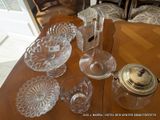 a table with a lot of glass items on it