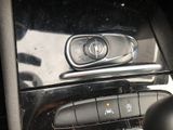 a close up of a car ' s controls and buttons