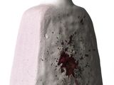 a white vase with a blood splattered design on it