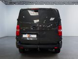 an image of a black van parked in a garage
