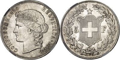 a silver coin with a cross on the front and a crown on the back